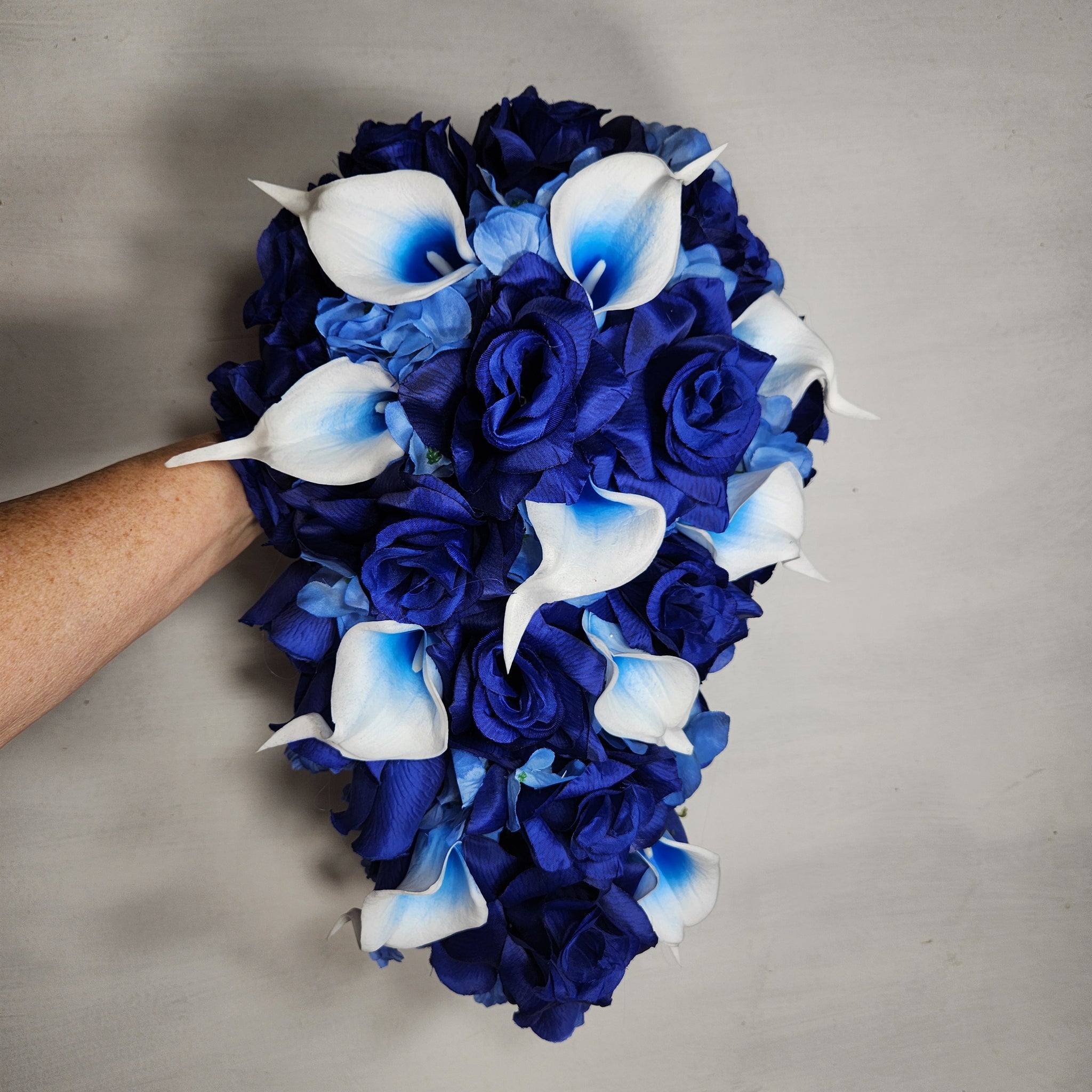 blue roses and white calla lilies bouquet Royal Blue Calla Lily and Rose Cascade Wedding Bouquet