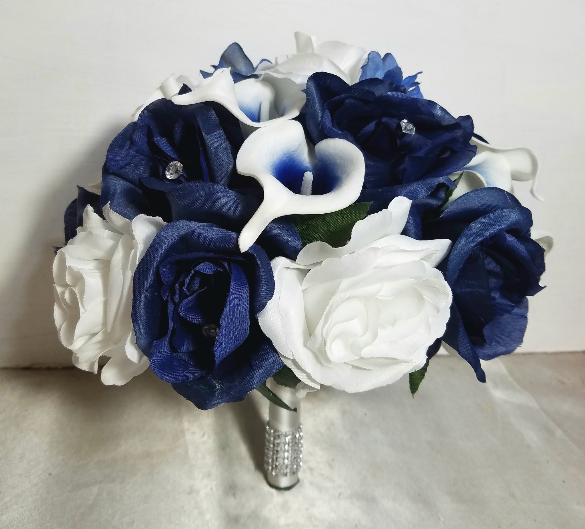 navy blue and white calla lily White & Navy Centred Calla Lilies With Roses Single White Rose Buttonhole